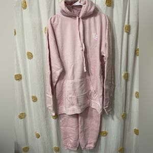 Matching pink Taylor Swift hoodie and sweat pants